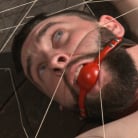 Jackson Fillmore in 'Suspended in a center split, helpless uncut stud blows a huge load!'