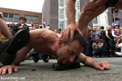 Josh West - Muscle slave is stripped naked, used and humiliated while hordes of people take photos. | Picture (4)