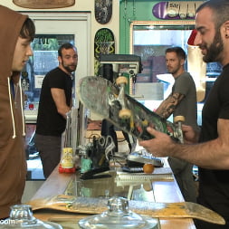 Horny crowd jumps on a ripped stud in a skate shop