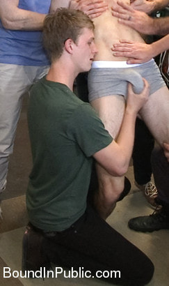 Horny crowd jumps on a ripped stud in a skate shop