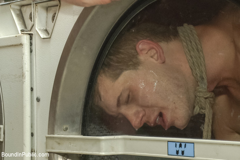 Rude punk gets gangbanged and shoved in the dryer at the laundromat