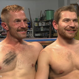 Cocky businessman bound and fucked in the metal shop