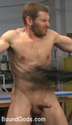 Cocky businessman bound and fucked in the metal shop