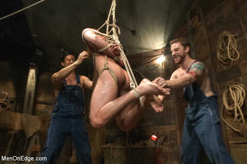 Hairy Muscle Hunk Has His Cock Edged By Two Farmers