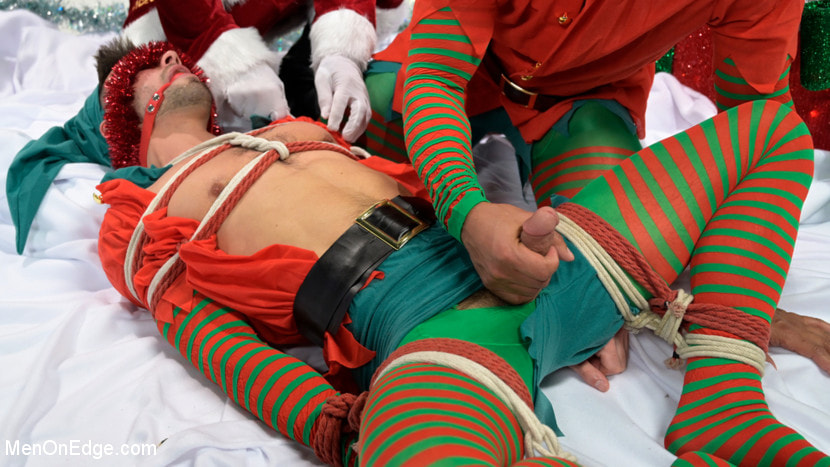 Impish Little Elves: Casey Everett Edged by Santa and his Lil Helper