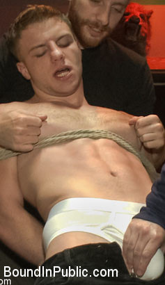 Ripped stud with a giant cock get used in a crowded bar