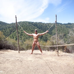 Captured straight jock gets his tight ass violated in the deep woods