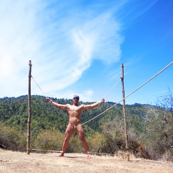 Captured straight jock gets his tight ass violated in the deep woods