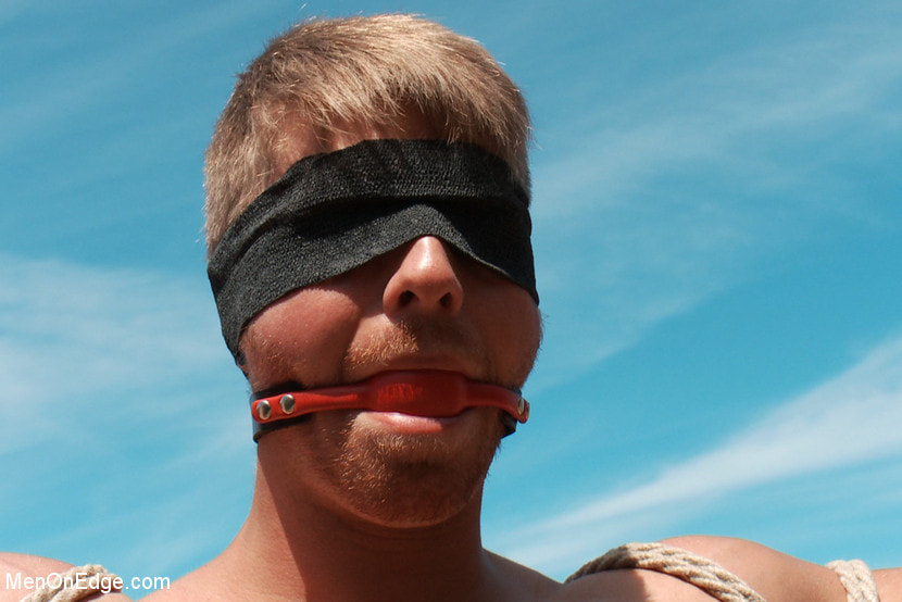 Captured straight jock gets his tight ass violated in the deep woods