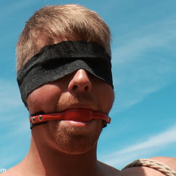 Captured straight jock gets his tight ass violated in the deep woods