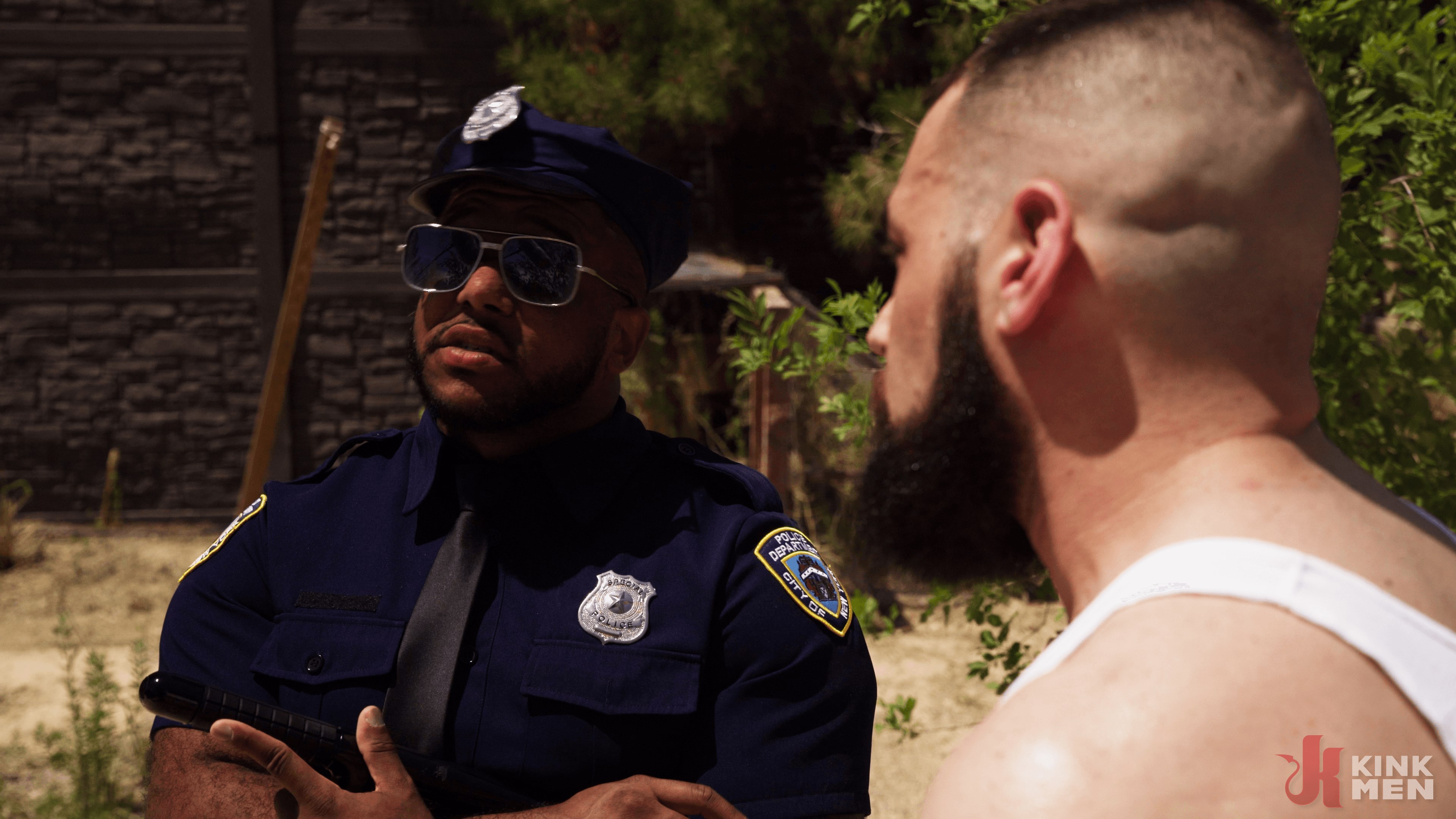 Good Behavior: Inmate Joseph Ox Submits to Officer Micah Martinez