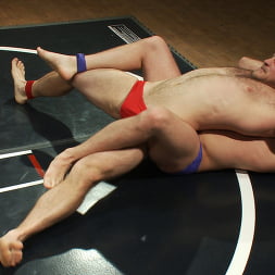 Muscled hunks duke it out in the gym, loser takes it in the ass!